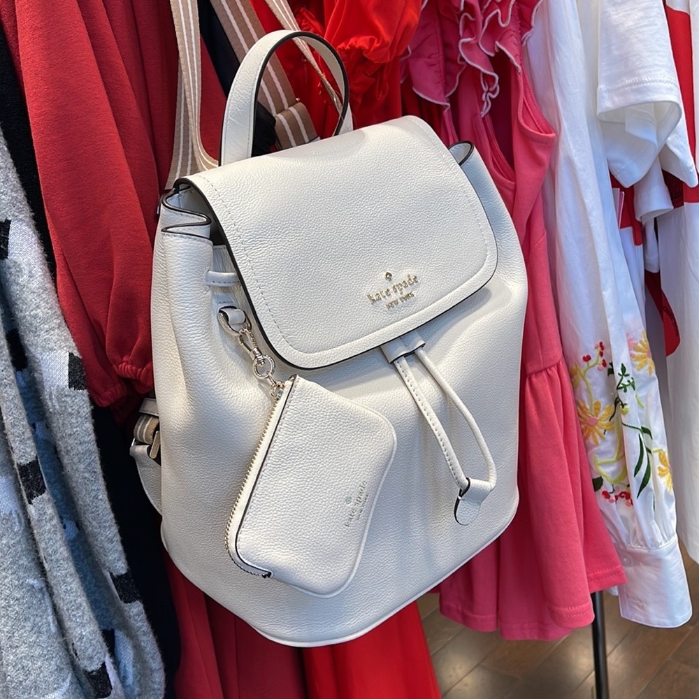 Kate Spade Rosie Medium Flap Backpack 
K8714 pebbled leather Parchment rosie
NWT - Picture 4 of 16